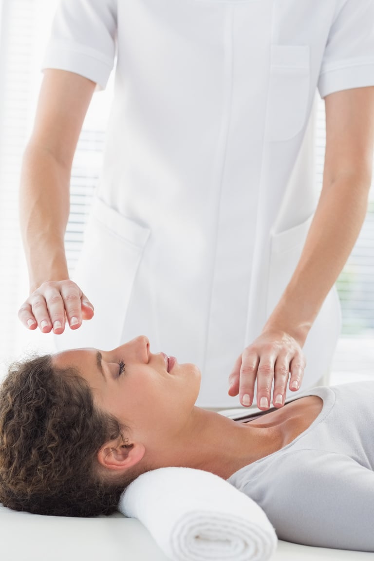 Woman receiving alternative therapy